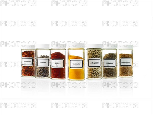 Studio shot of Jars with spices on white background. Photo : David Arky