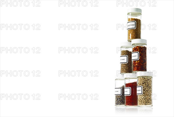 Studio shot of Jars with spices on white background. Photo: David Arky