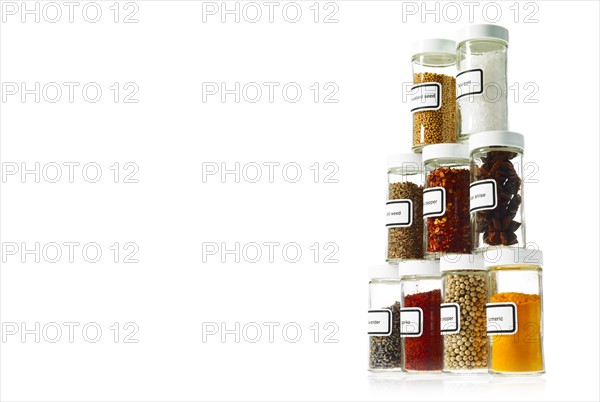 Studio shot of Jars with spices on white background. Photo: David Arky