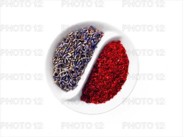 Studio shot of lavender flowers and paprika in Yin and Yang shape. Photo : David Arky