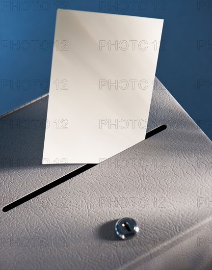 Ballot box and blank paper, studio shot. Photo: Daniel Grill