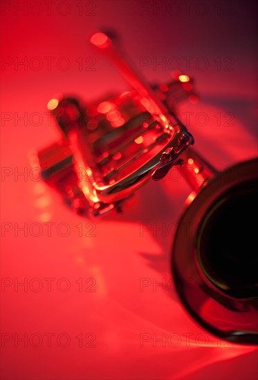 Close up of trumpet on red background. Photo: Daniel Grill