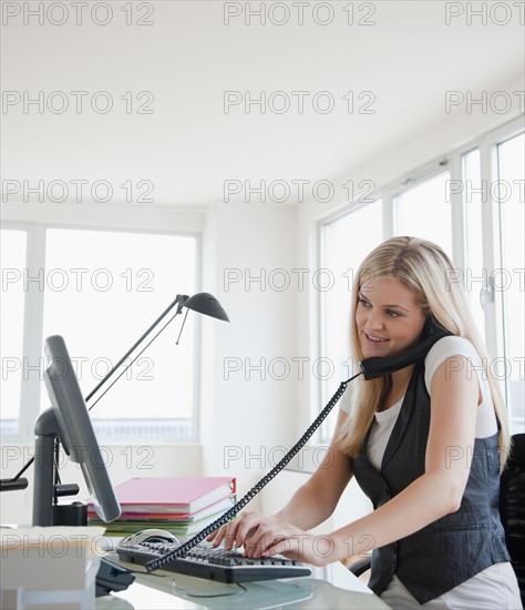 Businesswoman at work. Photo : Jamie Grill