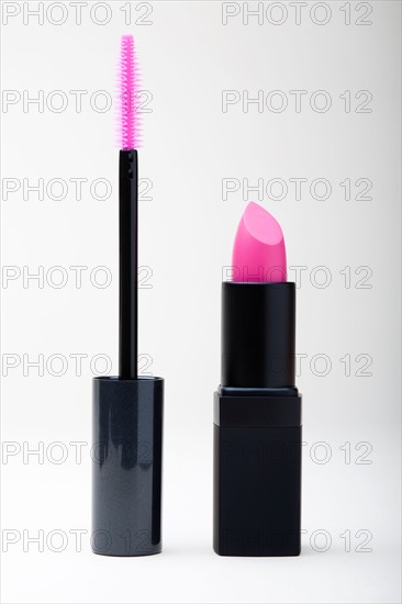 Studio shot of pink lipstick and mascara. Photo : Winslow Productions