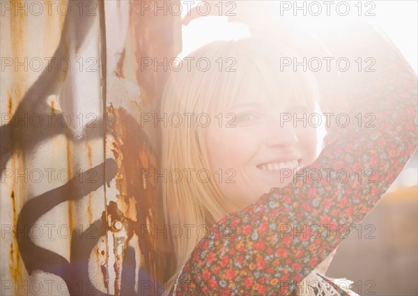 USA, Brooklyn, Williamsburg, Portrait of blonde woman in backlit. Photo: Jamie Grill