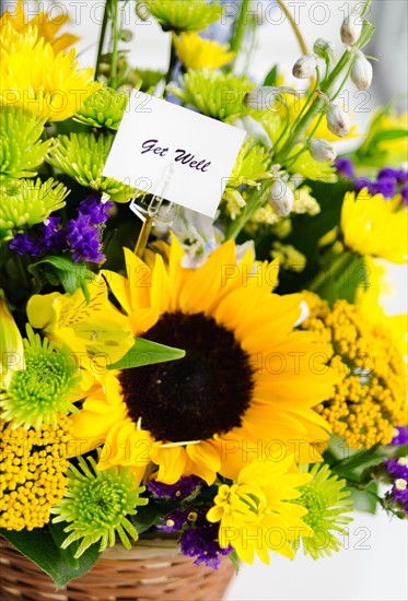 Bouquet of flowers with card.