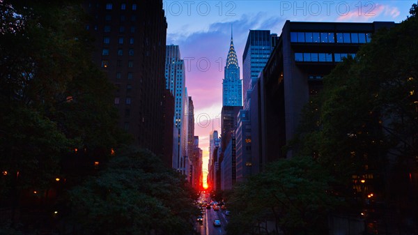 USA, New York, New York City, Chrysler Building and street at sunset.