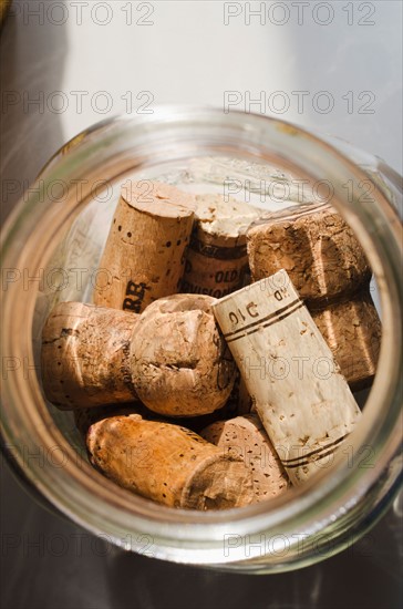 Wine corks in glass jar.