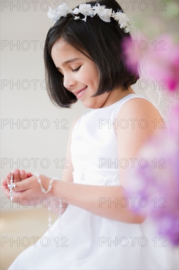 Portrait of girl (8-9) celebrating Fist Communion. Photo : Jamie Grill