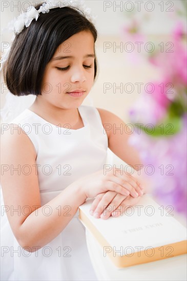 Portrait of girl (8-9) celebrating Fist Communion. Photo : Jamie Grill