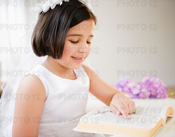 Portrait of girl (8-9) celebrating Fist Communion. Photo : Jamie Grill