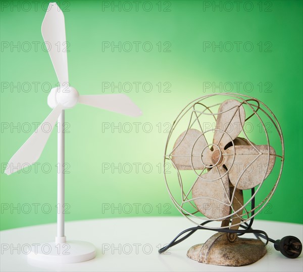Close up of model of wind turbine and vintage electric fan. Photo : Jamie Grill