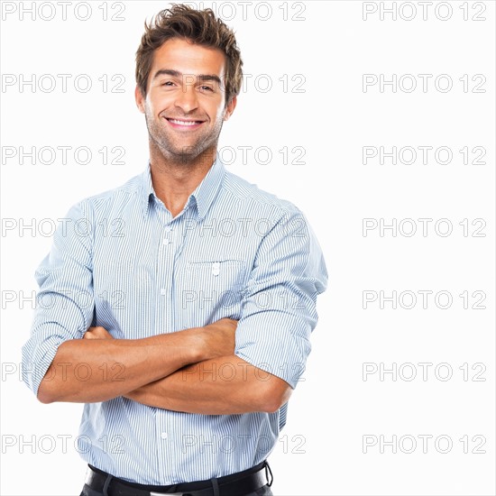 Portrait of smiling business man standing. Photo : momentimages