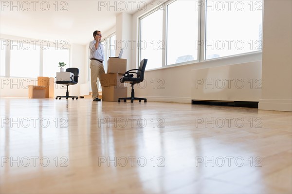 Businessman setting up office.