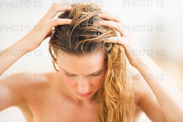 Woman washing hair.