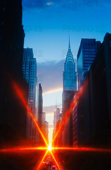 USA, New York, New York City, Chrysler Building and street at sunset.