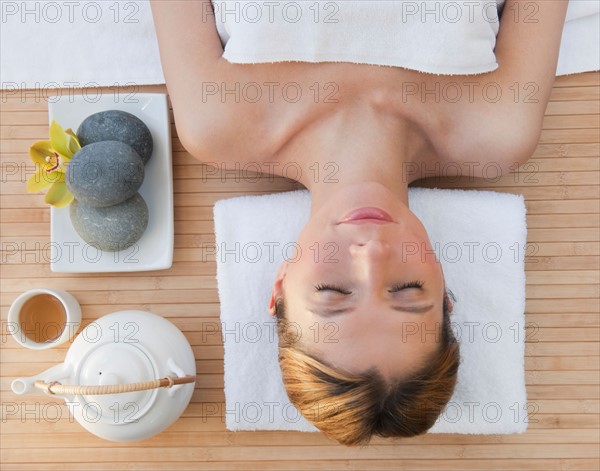 Woman relaxing at health spa.