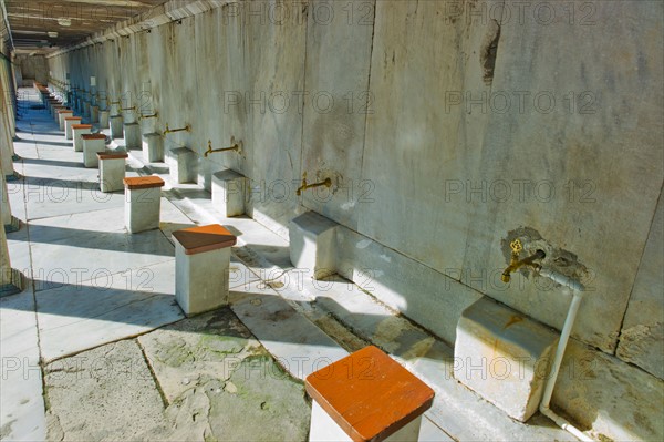 Turkey, Istanbul, Sultanahmet Mosque wash stands.