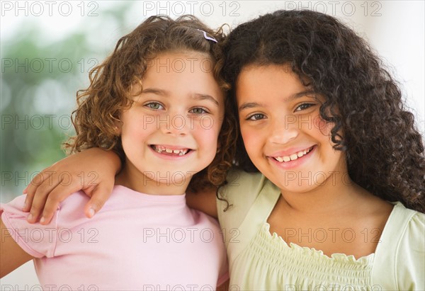 Portrait of two girls (6-9).