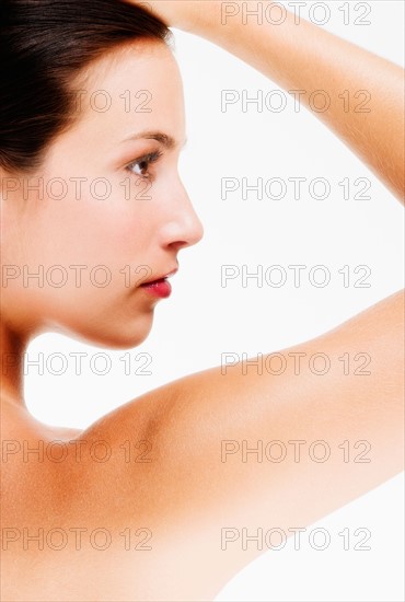 Studio portrait of young woman.