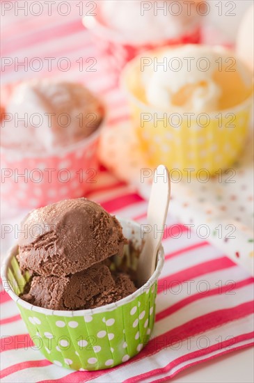 Close up of ice cream in colorful cups. Photo : Jamie Grill