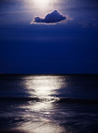 USA, New York, Queens, Rockaway Beach, Landscape with sea and moonlight at night. Photo : Jamie Grill
