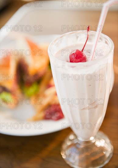 Close up of meal and milkshake. Photo : Jamie Grill