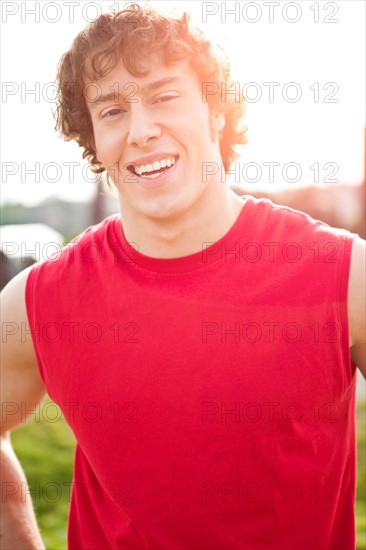 Portrait of young athlete smiling. Photo : Take A Pix Media