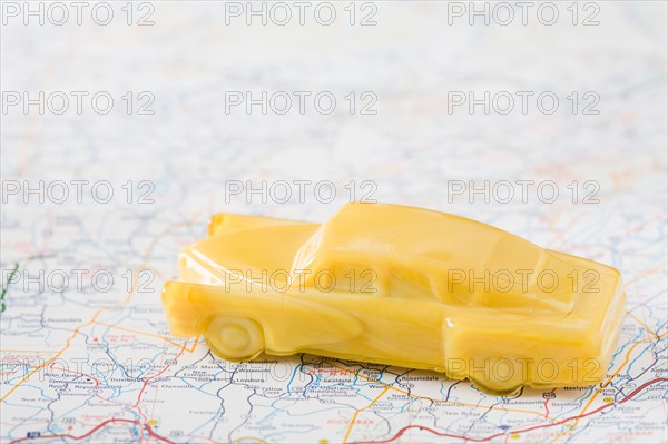 Studio shot of old-fashioned toy car. Photo: Kristin Lee