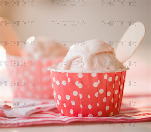 Close up of ice cream in colorful cups. Photo : Jamie Grill