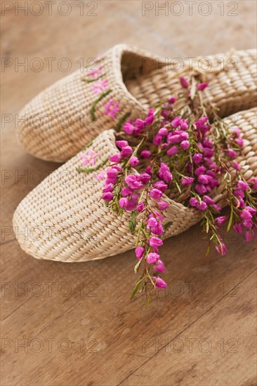 Flowers on slippers at spa.