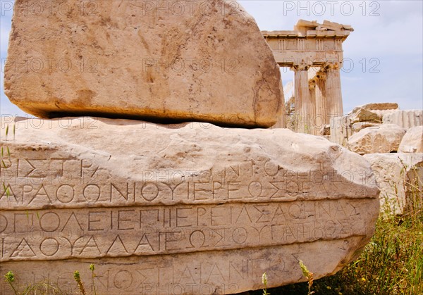 Greece, Athens, Acropolis, Greek inscription on ruins of Parthenon.