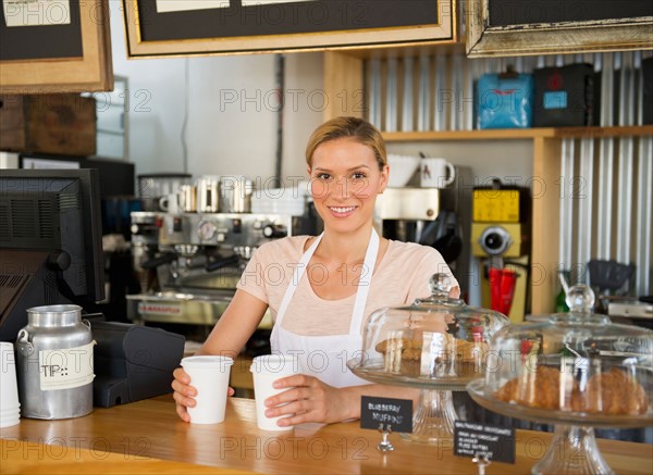 Female cafe owner.