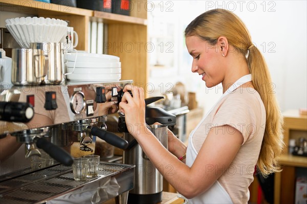 Female cafe owner.