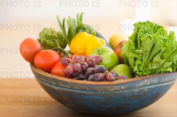 Bowl of organic fruit and vegetables.