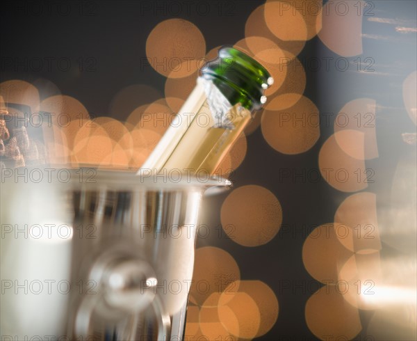 Close up of champagne in ice bucket. Photo : Jamie Grill