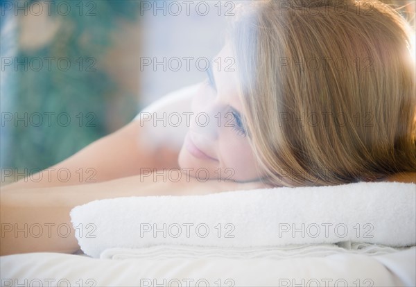 Woman relaxing in spa. Photo : Jamie Grill