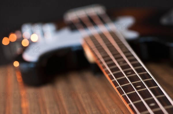 Close up of bass guitar. Photo : Daniel Grill