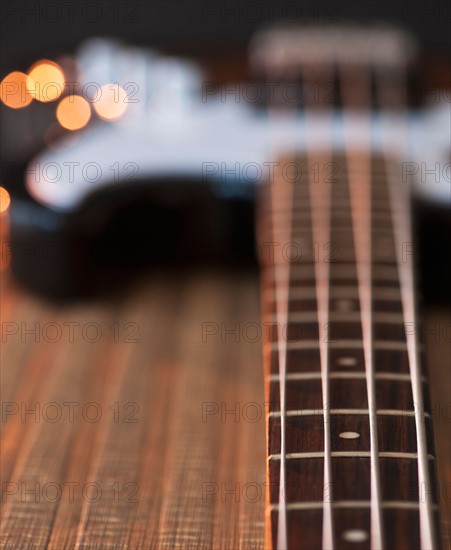 Close up of strings of bass guitar. Photo : Daniel Grill