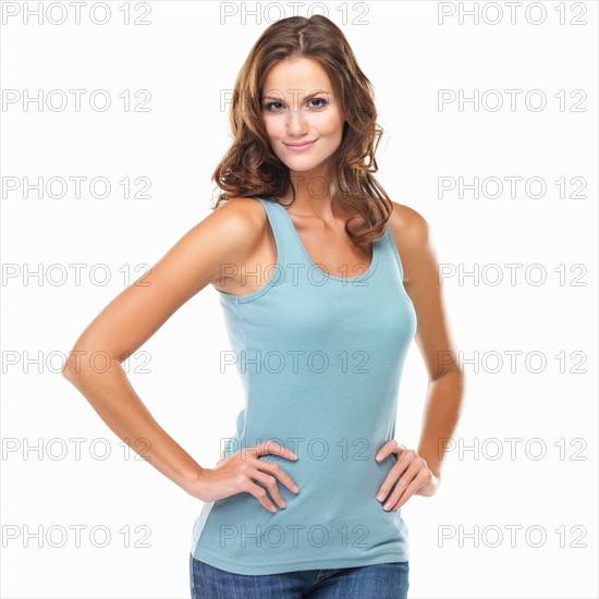 Studio portrait of attractive young woman smiling. Photo: momentimages