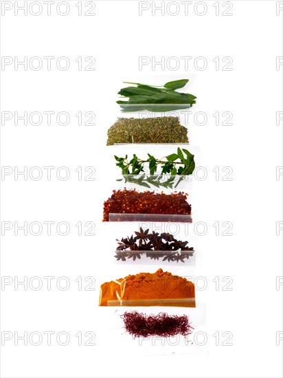 Studio shot of row of packets with spices. Photo : David Arky