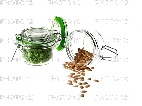 Studio shot of jars with Mixed Seeds on white background. Photo : David Arky