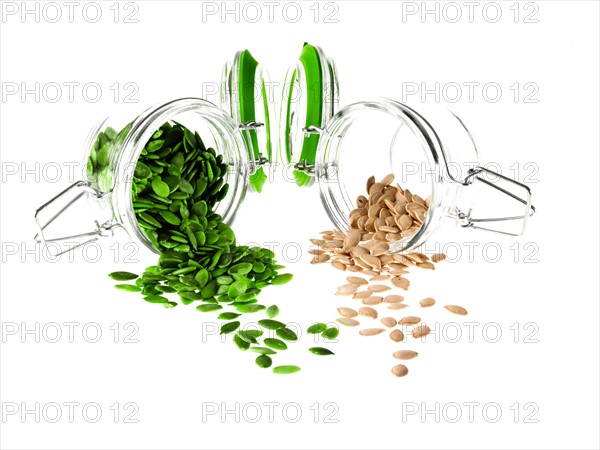 Studio shot of jars with Mixed Seeds on white background. Photo : David Arky