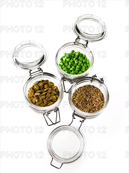 Studio shot of jars with Mixed Seeds on white background. Photo : David Arky