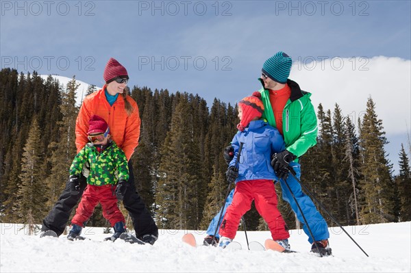 USA, Colorado, Telluride, Family skiing together. Photo: db2stock