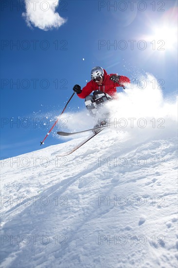 Male skier on fresh powder snow