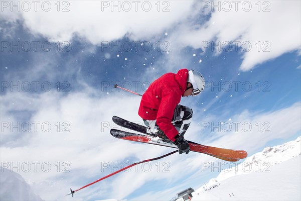 Male skier on fresh powder snow