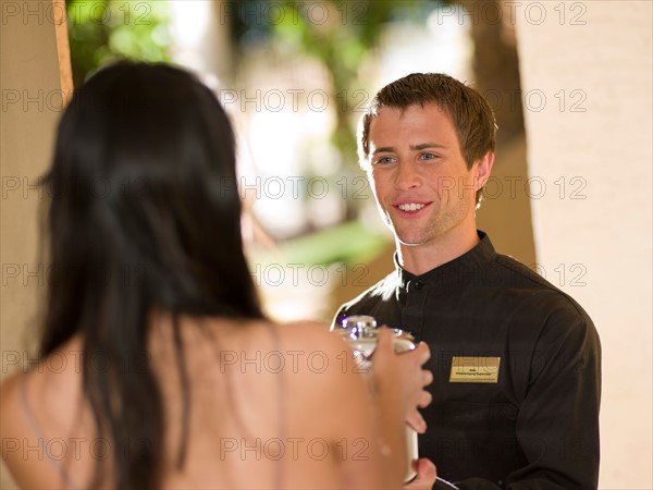 Man from room service delivering . Photo: db2stock