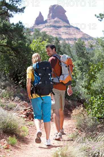 Man and woman hiking outdoors