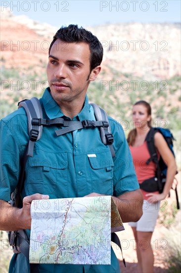 Man and woman hiking outdoors